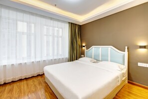 Appartement, 1 grand lit | Rideaux occultants, chambres insonorisées, Wi-Fi gratuit, draps fournis
