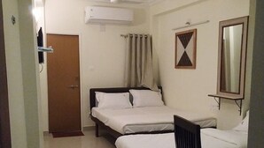 Deluxe Triple Room, 1 King Bed | WiFi (free) - Hotel Basera (Ahmedabad)