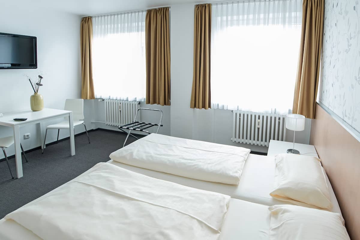 basic double room | desk, laptop workspace, blackout curtains, iron/ironing board