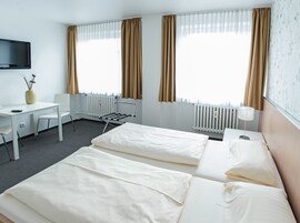 Basic Double Room | Desk, laptop workspace, blackout drapes, iron/ironing board (on request)