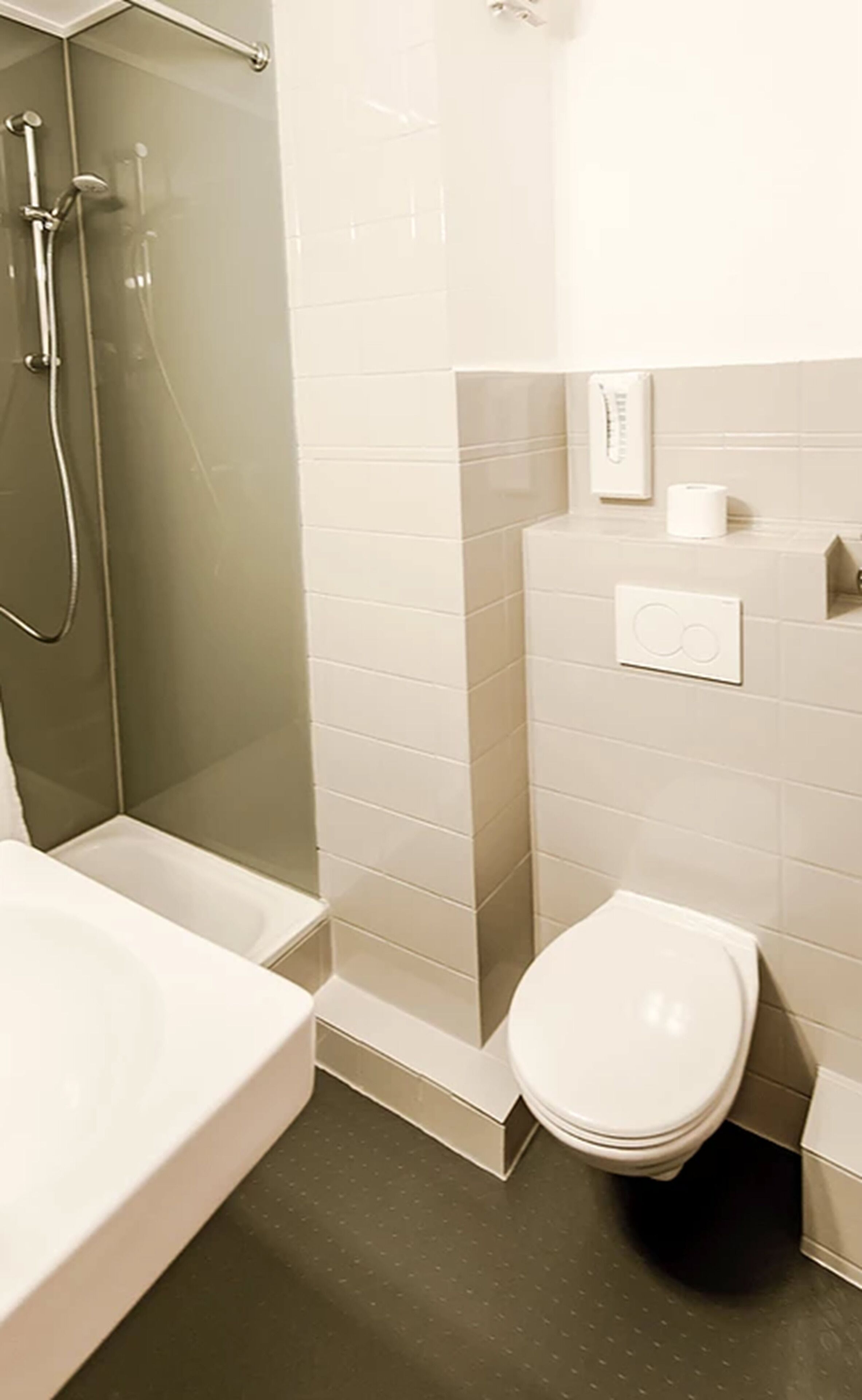 basic single room | bathroom | shower, hair dryer, towels, soap