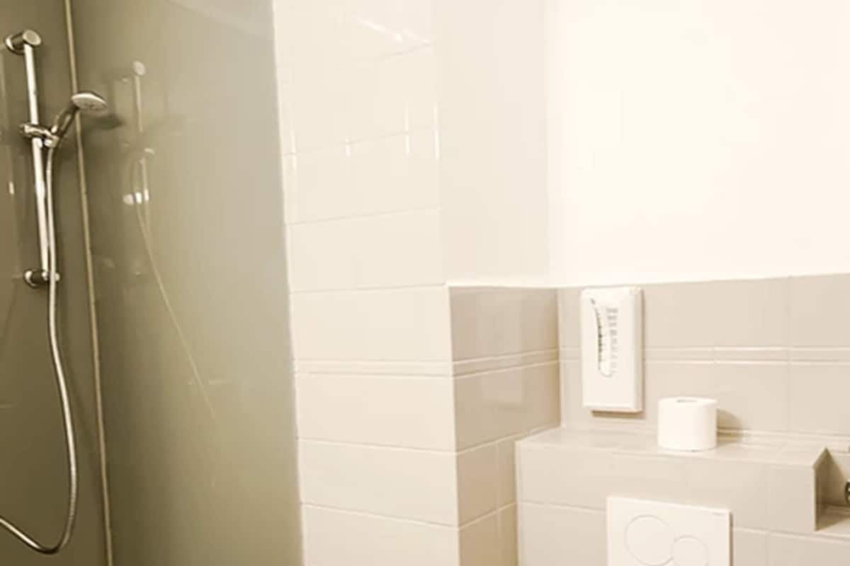 basic single room | bathroom | shower, hair dryer, towels, soap