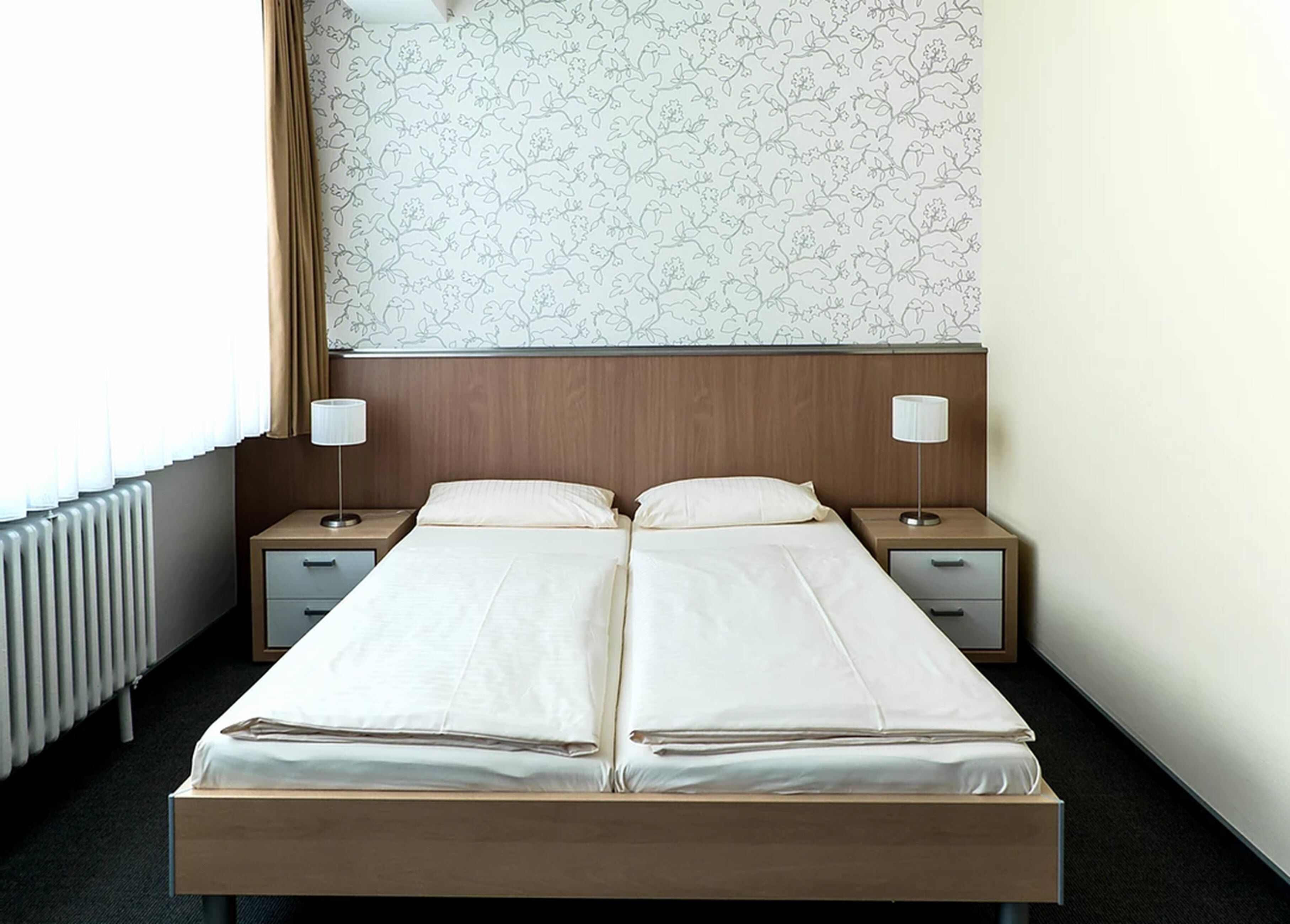 basic double room | desk, laptop workspace, blackout curtains, iron/ironing board