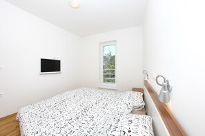 2 chambres, coffre-fort, accès au Wi-Fi (inclus), literie fournie