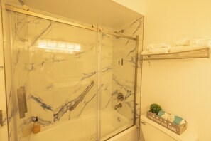 Hair dryer, towels, soap, shampoo