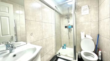 Hair dryer, towels, soap, toilet paper