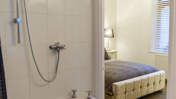 Luxury House, 1 Double Bed | Bathroom | Combined shower/bathtub, deep-soaking bathtub, hair dryer, towels