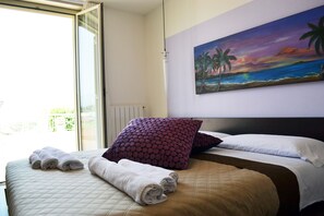 3 habitaciones, tabla de planchar con plancha, wifi y ropa de cama 