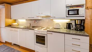 Fridge, microwave, dishwasher, cookware/dishes/utensils