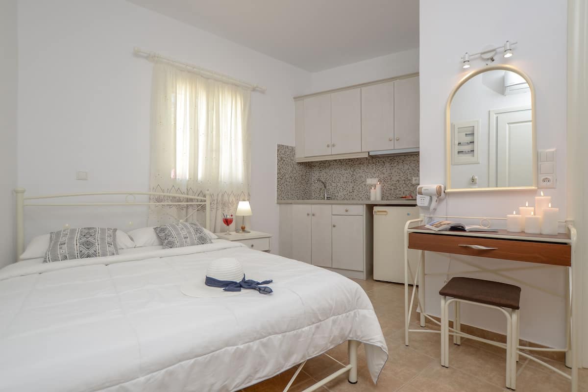 Economy Double Room, Ground Floor | 1 bedroom, pillowtop beds, in-room safe, individually furnished