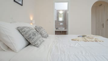 Suíte júnior, vista para o mar | Camas com colchões pillow-top, cofres nos quartos