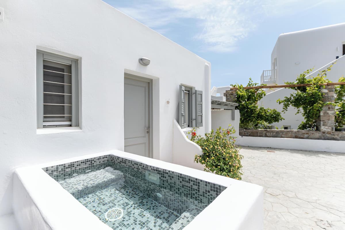 Family Apartment, Hot Tub | Private spa tub
