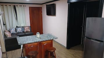 50-inch flat-screen TV with premium channels, Smart TV