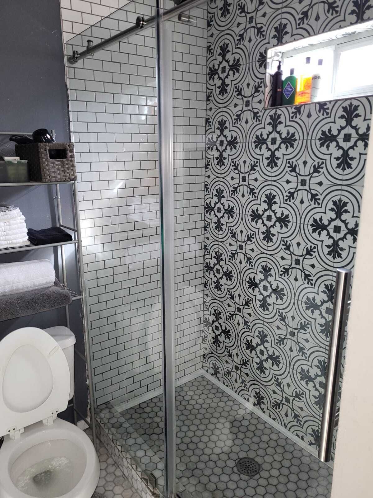 Combined shower/tub, hair dryer, towels, soap