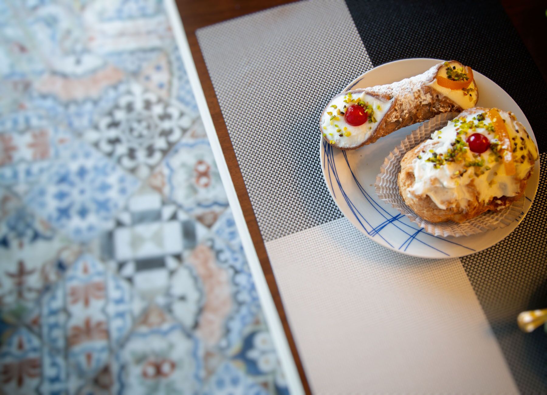 A plate with pastries on a table.