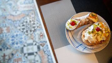 A plate with pastries on a table.