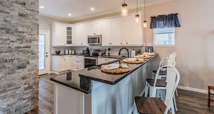 Experience the Captain's Quarters. A Historic 1920 American Four Square.