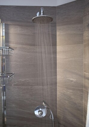 Shower, hair dryer, towels, soap