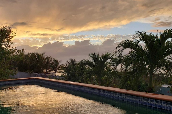 Poolside view at sunset