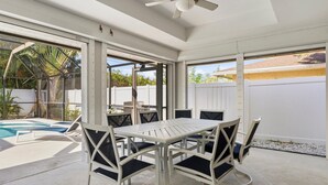 Outdoor dining - NEW Pinball! Luxury Home, Stunning Large Pool/Spa, Close to Beaches, FREE Bikes (Naples)