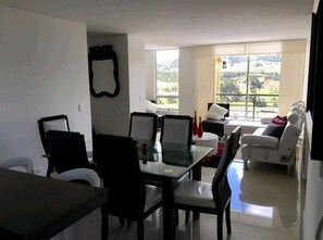 Family Apartment | Living room | 42-inch LED TV with cable channels, TV, Netflix