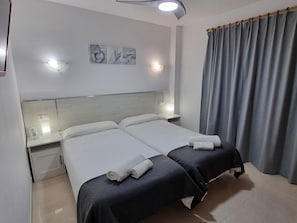 3 chambres, coffres-forts dans les chambres, fer et planche à repasser