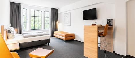 Businesshuoneisto | Oleskelualue | LED-televisio