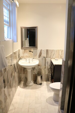 Shower, towels, soap, shampoo