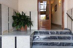 Enter through the elegant door marked '9' to a beautifully designed space.
