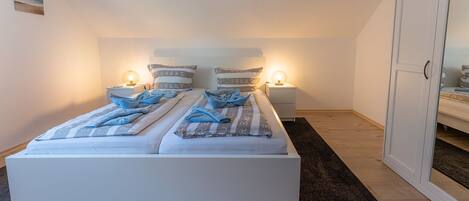 2 dormitorios, tabla de planchar con plancha, cuna de viaje y wifi