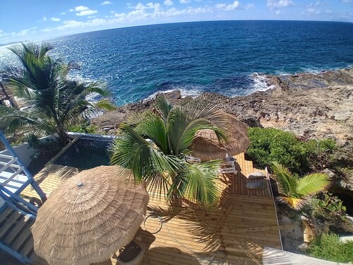 Magnificent one-bedroom apartment - 80m2, private pool Terrasse, deck on Océan