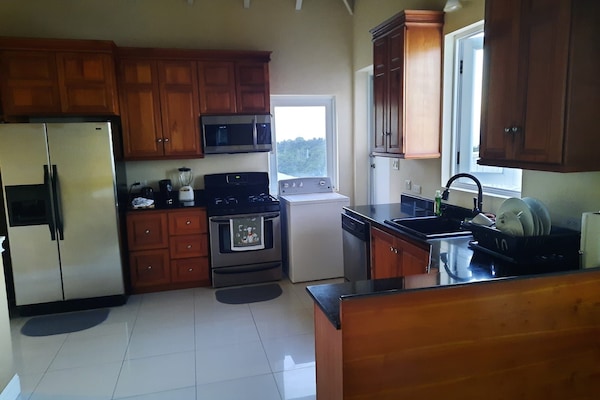 This spacious kitchen comes complete with everything you need