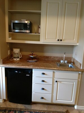 Fridge, microwave, coffee/tea maker, paper towels