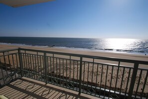 A balcony with a view of the beach and ocean. - Edgewater House - Ocean Front Units With Spectacular Views! (Rehoboth Beach)