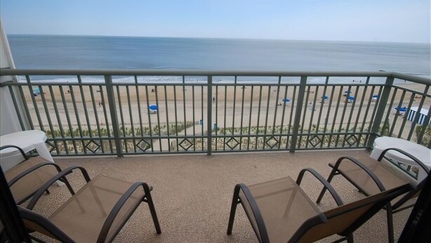 A balcony with a view of the beach and ocean. - Edgewater House - Ocean Front Units With Spectacular Views! (Rehoboth Beach)