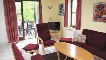 Télévision, cheminée, baby-foot