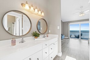 Combined shower/bathtub, towels, soap, toilet paper