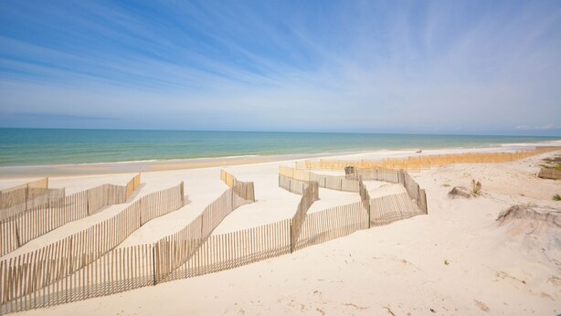 A beach with wooden fences and a clear view of the ocean. - Direct Beachfront, gorgeous sunsets, gated community, north Cape near state park (Port St. Joe)