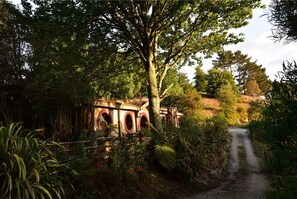 Spanning a serene landscape, this historic bridge offers a glimpse into a bygone era.