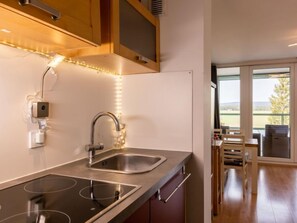 Fridge, oven, cookware/dishes/utensils