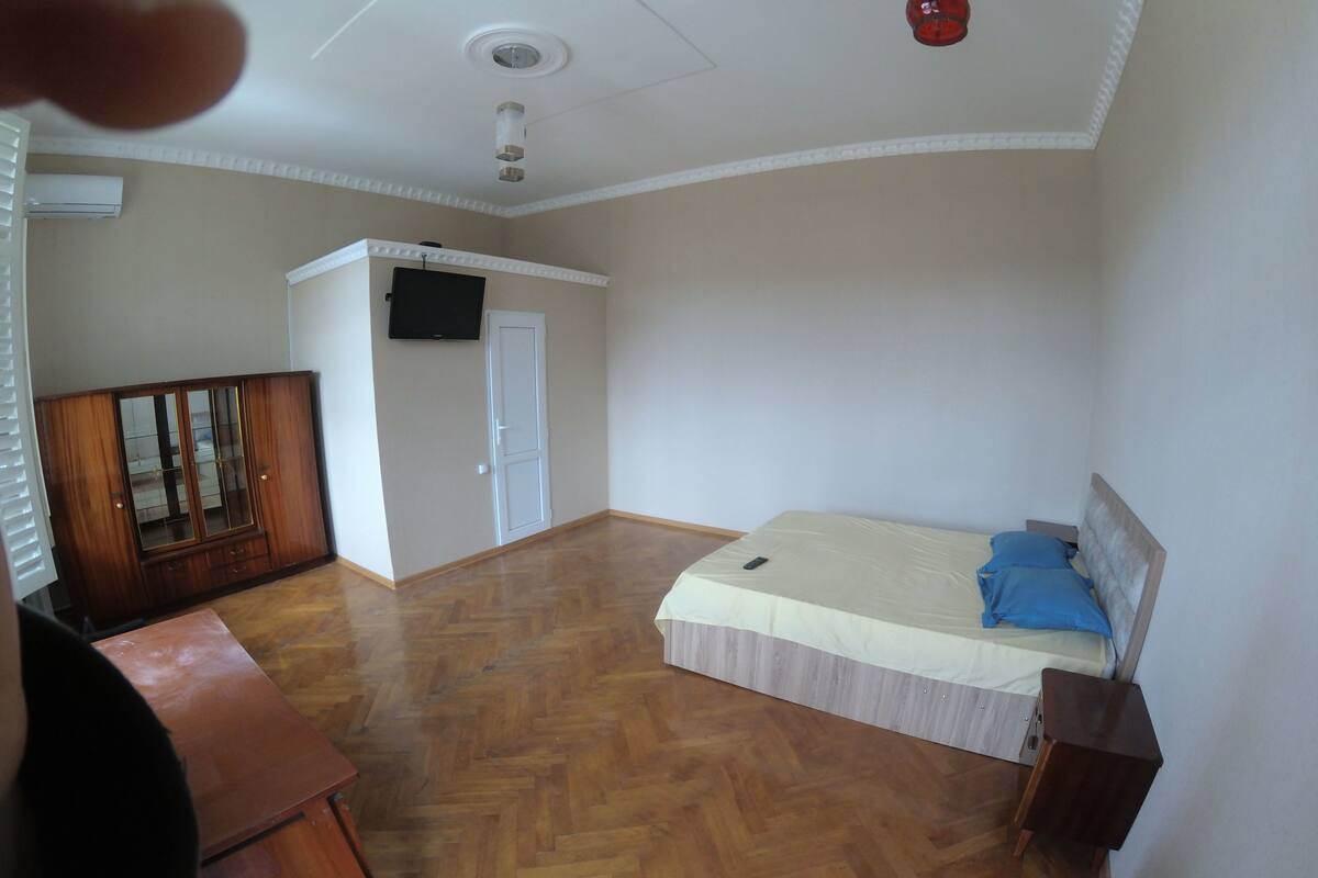 Family Quadruple Room, City View | Desk, laptop workspace, free WiFi, bed sheets