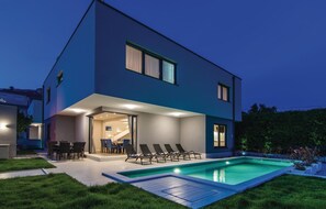 A modern two-story house with a swimming pool, outdoor seating, and a staircase leading to the upper floor. - Beautiful home in Kastel Kambelovac (Kastel Kambelovac)