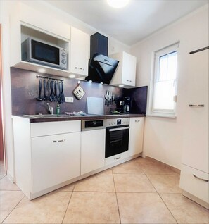 Fridge, microwave, oven, dishwasher