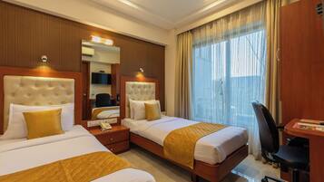 Quarto luxo | 1 quarto, escrivaninha, cortinas blackout, Wi-Fi de cortesia