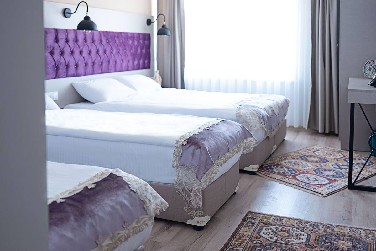 Standard Quadruple Room | 1 bedroom, in-room safe, desk, laptop workspace
