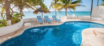 Perfect for a large group! Beachfront 7 bedroom villa with pool, AC and WiFi!