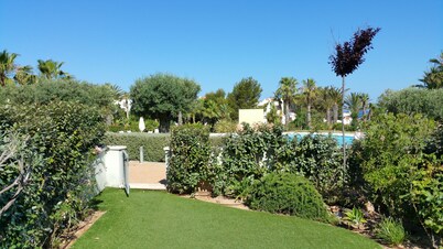 Large garden floor with direct access to the playground and pool. Beach and restaurant