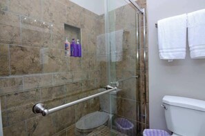 Shower, hair dryer, towels, soap