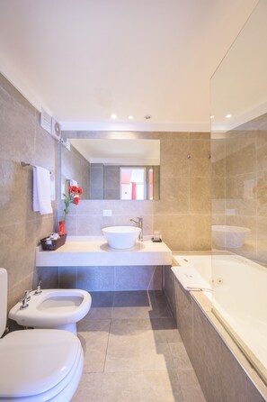 Combined shower/bathtub, jetted bath, hair dryer, bidet