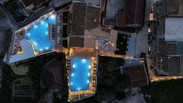 2 outdoor pools, pool umbrellas, sun loungers